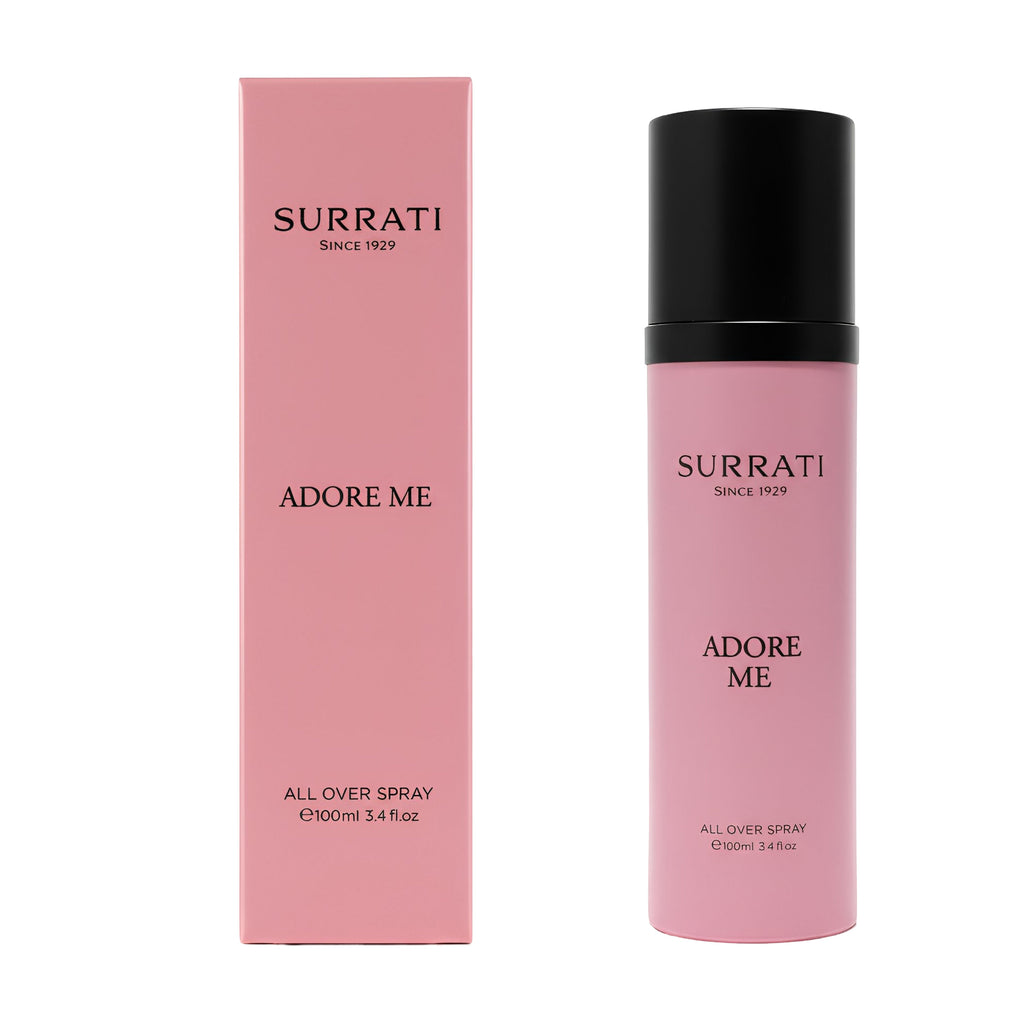 Surrati ADORE ME All Over Spray 120ml bottle with a black cap next to its pink packaging box, on a white background.