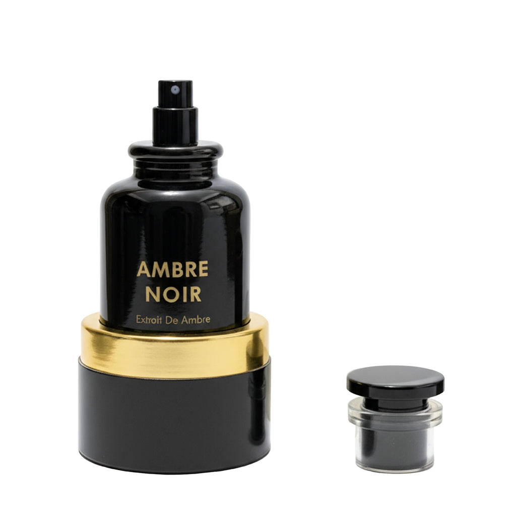 Black and gold perfume bottle labeled 'Ambre Noir' on a white background