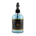 Surrati luxury fragrance bottle with black pump on a white background