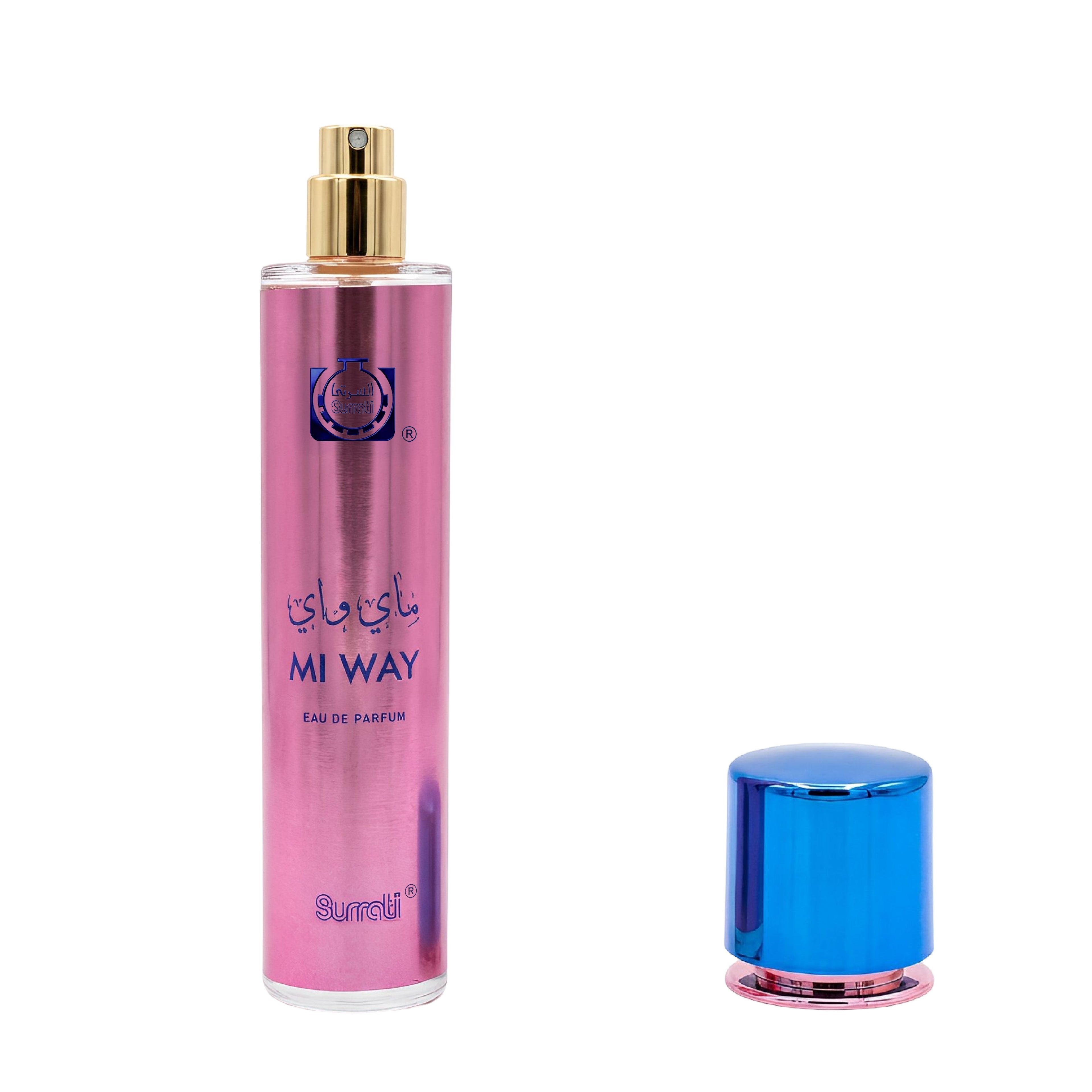 A pink cylindrical perfume bottle labeled 'MI WAY' with a gold spray top, shown next to a separate metallic blue cap on a plain white background.