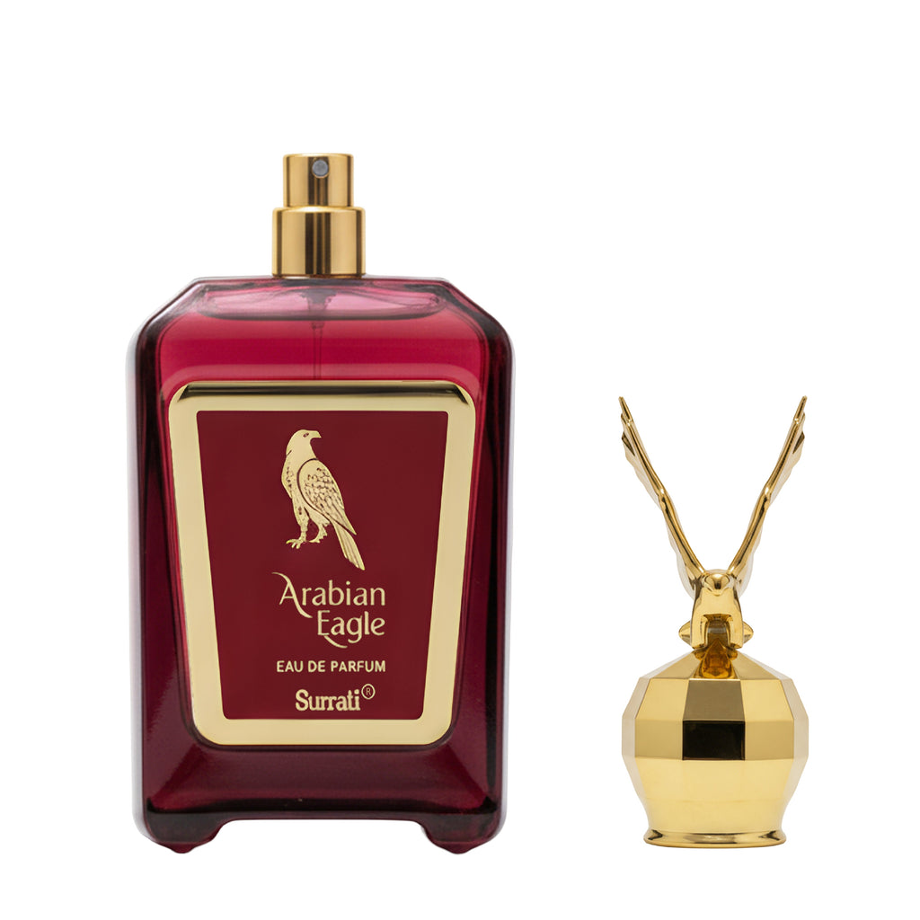 Red and gold Arabian Eagle perfume bottle on a white background
