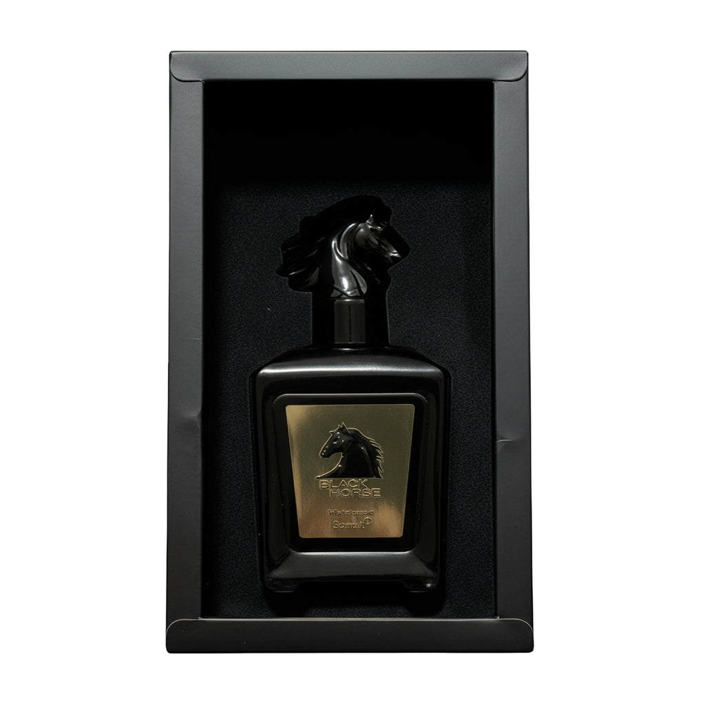 Black horse perfume bottle in a black box on a white background