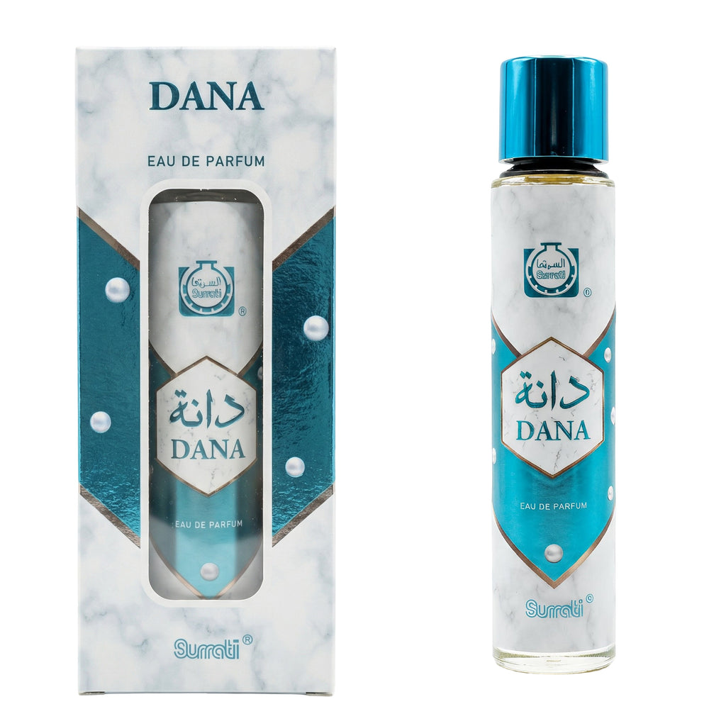 DANA Eau de Parfum by Sumati, shown in a clear cylindrical bottle with a metallic blue cap next to its matching retail box. The packaging features a white marble pattern with teal geometric accents and the brand name 'DANA' in blue.