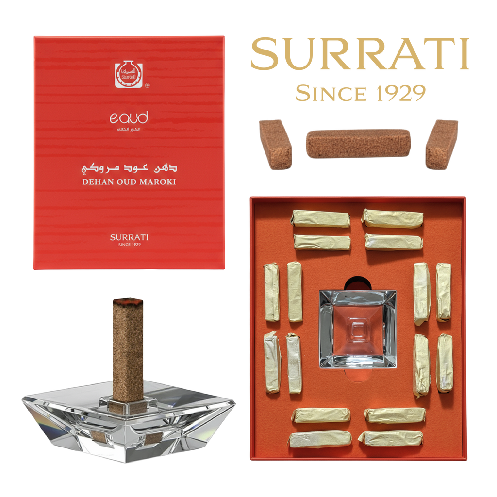 Surrati Dehan Qud Maroki set featuring a red outer box, a silver glass and cork incense holder, and multiple wrapped incense sticks arranged in an orange tray on a white background, with 'Surrati Since 1929' text at the top.