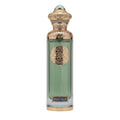 Perfume bottle with gold cap and decorative label on a white background