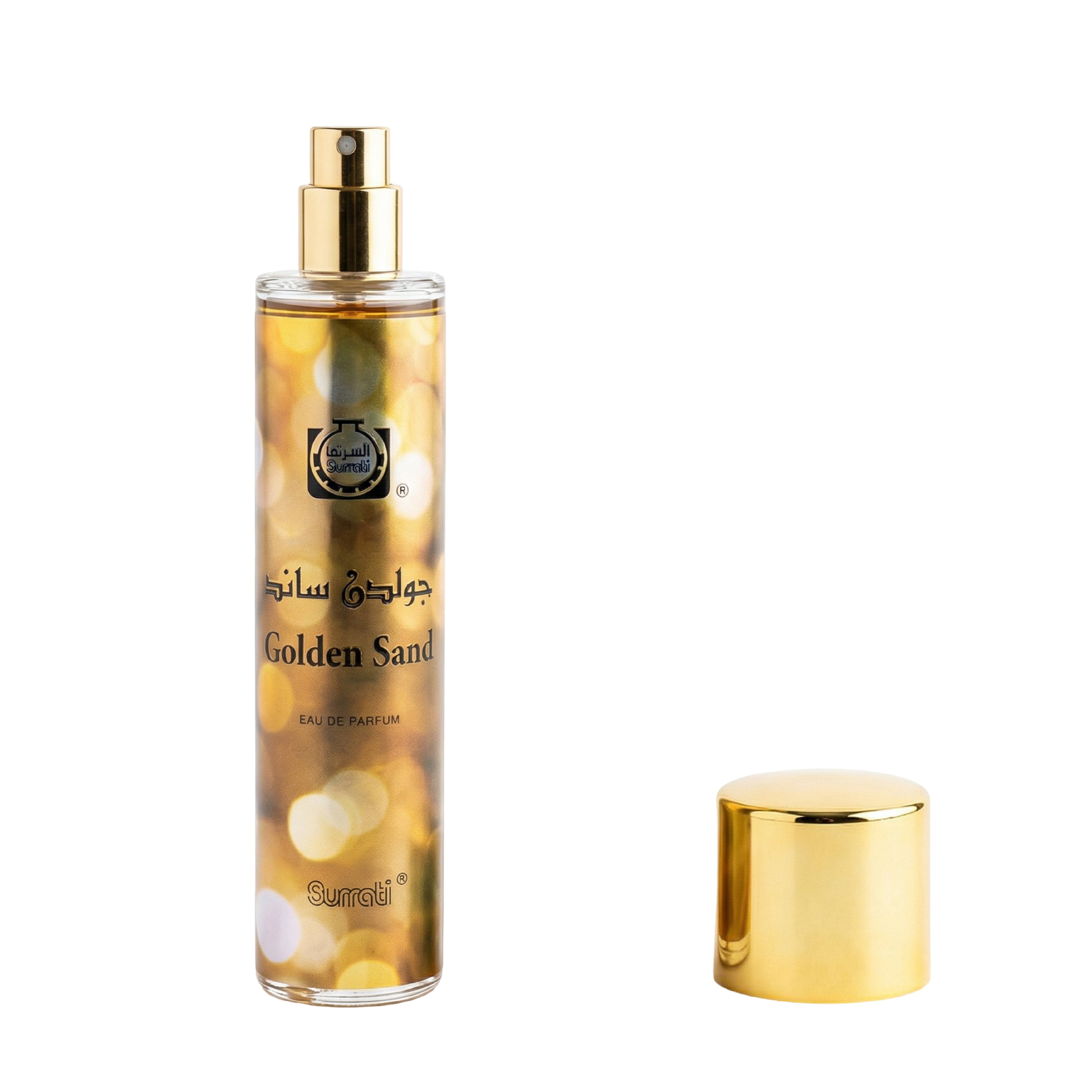 A clear cylindrical perfume bottle filled with golden liquid, labeled 'Golden Sand' with Arabic text and 'EAU DE PARFUM' below, shown with a separate shiny gold cap on a white background.