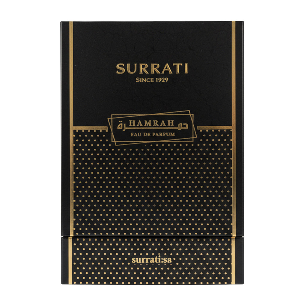 Surrati Hamrah Eau de Parfum packaging box, featuring a black textured cover with gold lettering and a gold polka-dot patterned lower half.