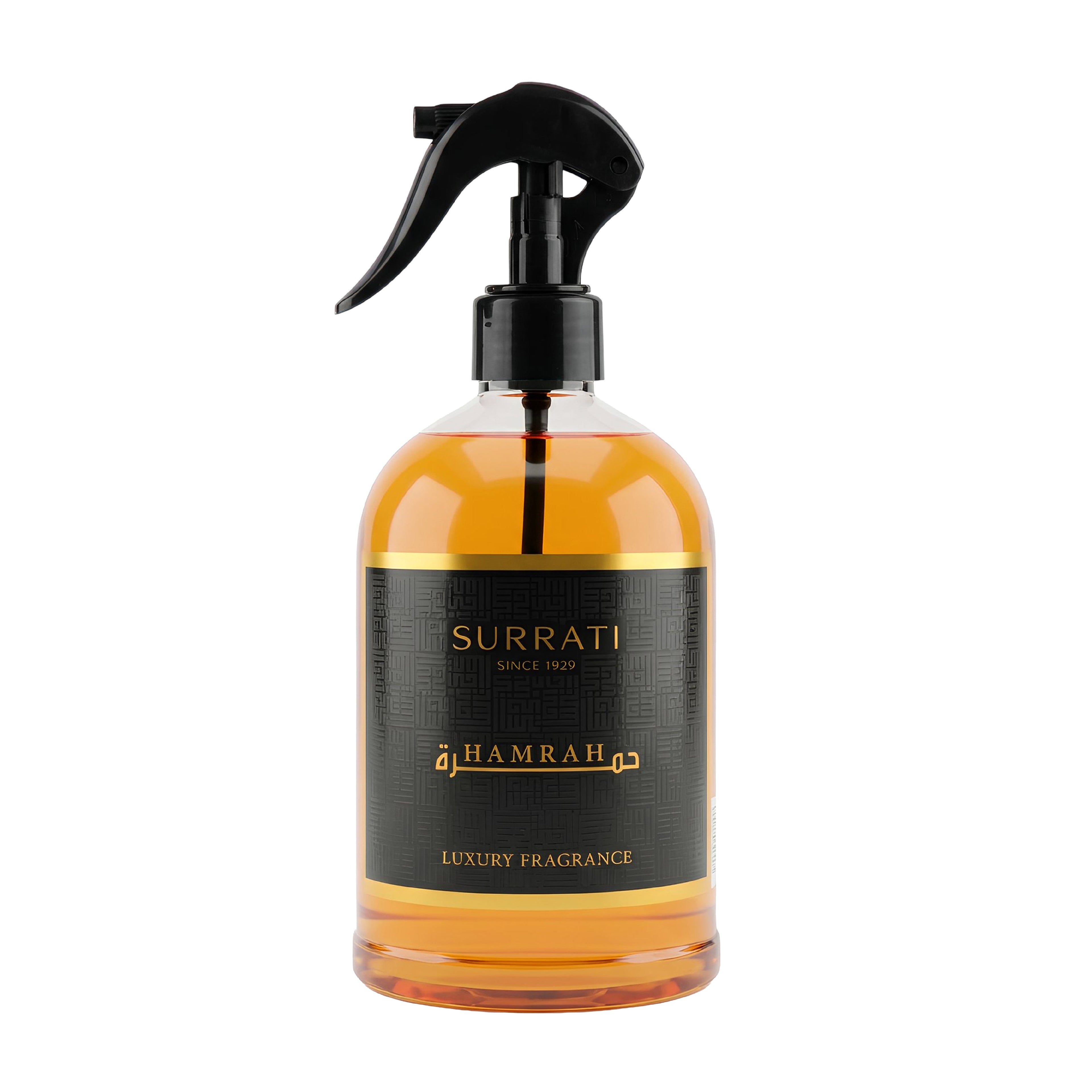 A clear glass spray bottle filled with amber-colored liquid, featuring a black trigger sprayer and a black label with gold text. The label reads 'Surrati' and 'Hamrah Luxury Fragrance'.