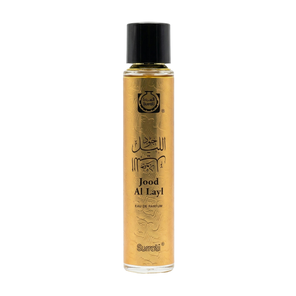 A bottle of Surati Jood Al Layl Eau De Parfum with a black cap and gold-colored liquid inside a clear glass bottle, shown on a white background.