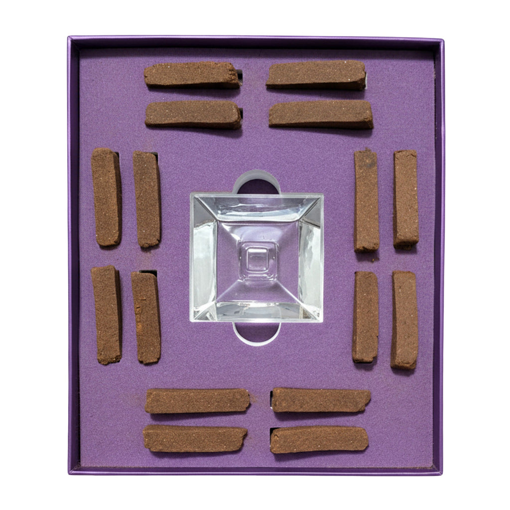 Crystal with brown rectangular objects on a purple background
