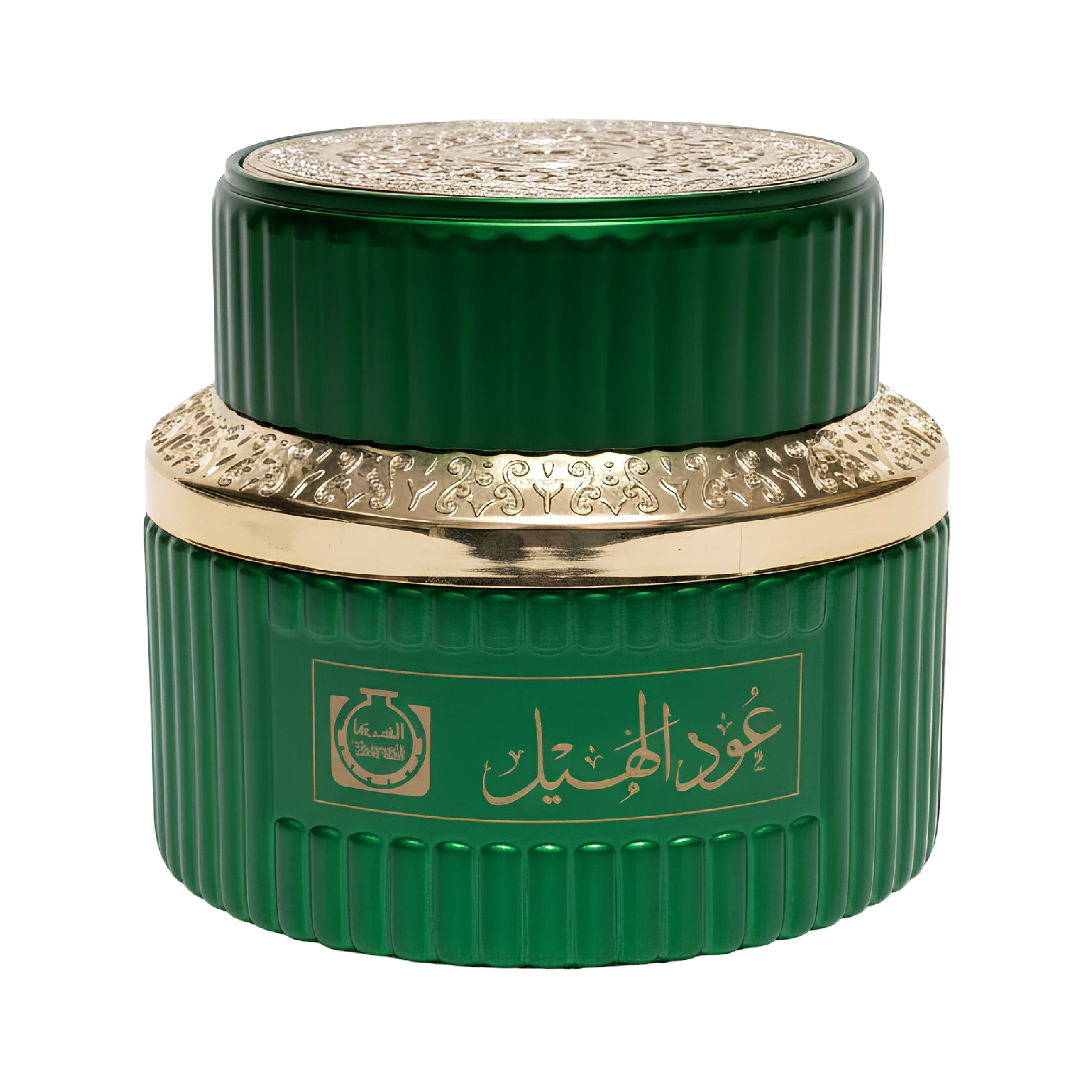 Green cosmetic jar with gold accents on a white background
