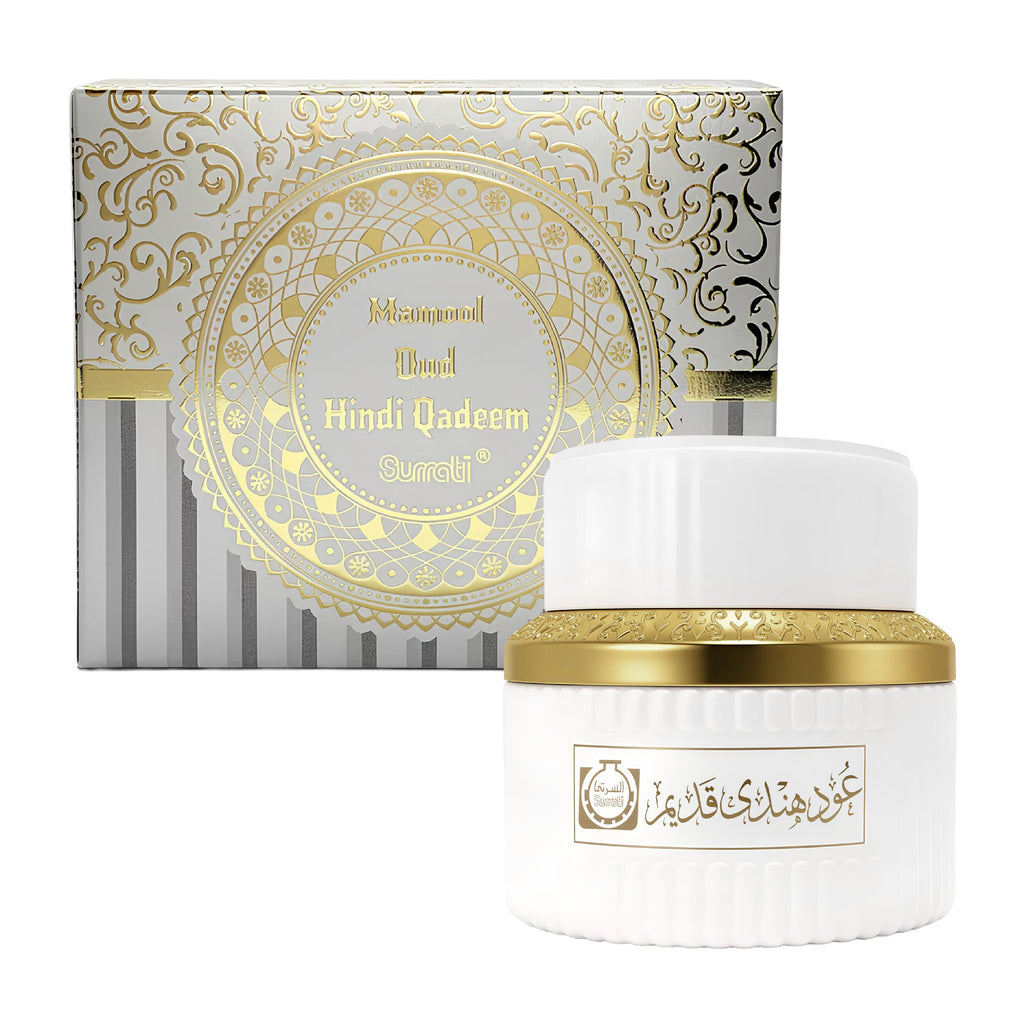 White and gold cosmetic jar with decorative box on a white background