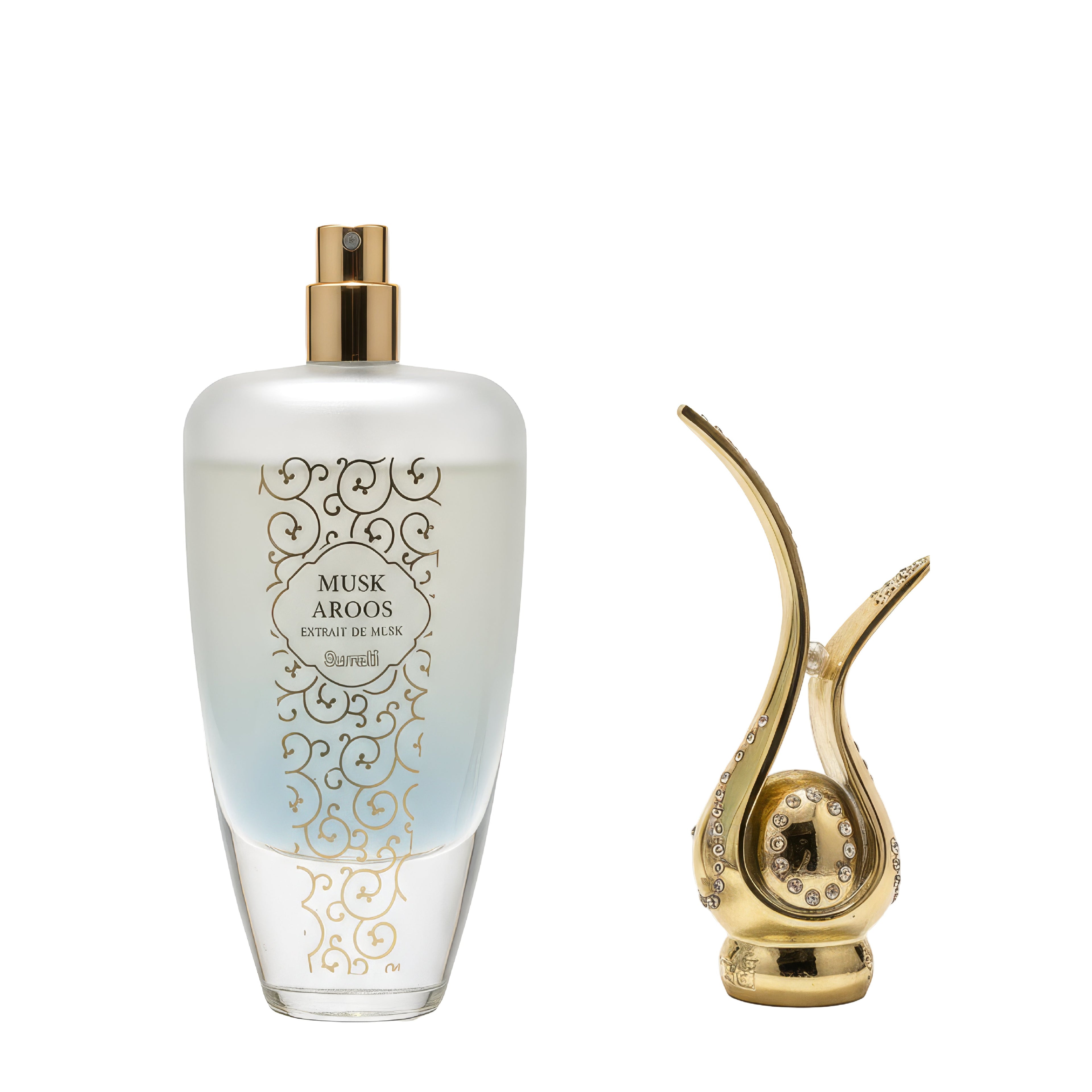 Perfume bottle with gold cap and intricate design, next to a gold and crystal decorative object on a white background