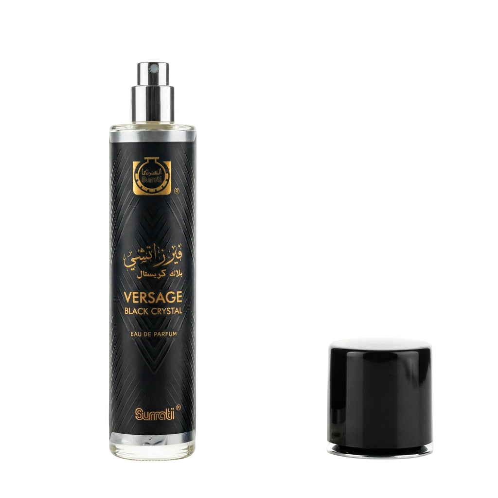 A bottle of Versage Black Crystal Eau de Parfum with its cap removed, displayed on a clean white background. The bottle is black with gold lettering and a silver spray nozzle, and the separate cap is shown to the right.