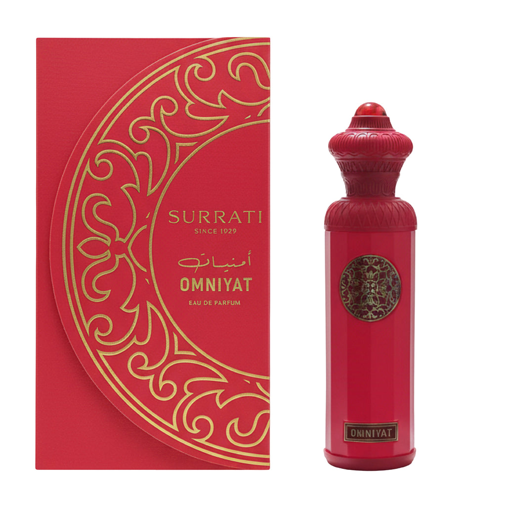 Red perfume bottle with intricate design and 'Surrati' packaging on a white background