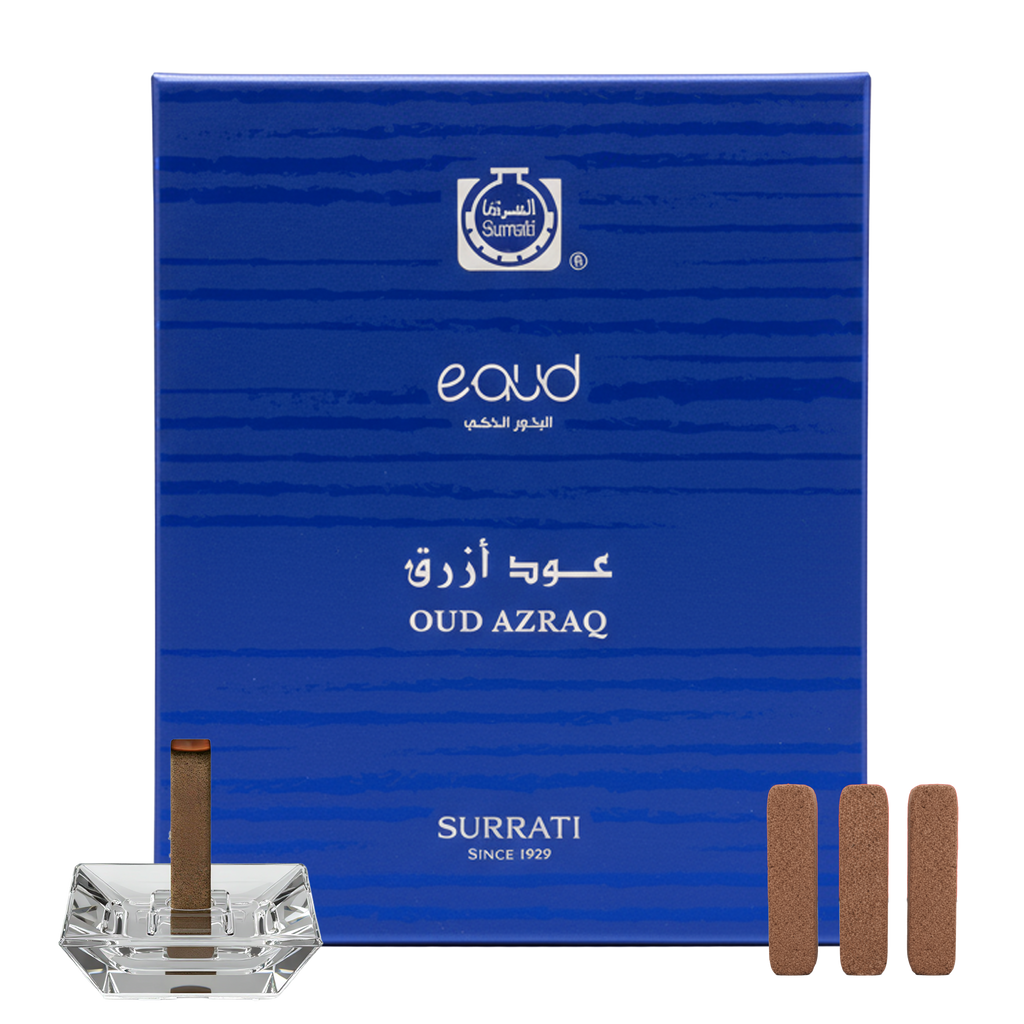 Blue Surrati incense box with incense sticks and a crystal holder on a white background
