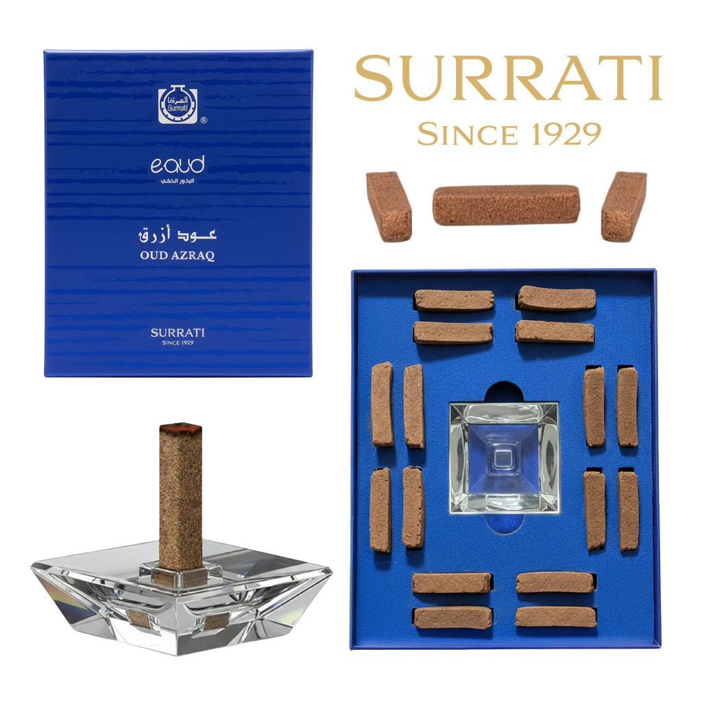 Surrati Oud Azraq fragrance set with a blue box, a lit incense stick in a clear glass holder, and multiple incense sticks arranged on a blue tray. The brand name Surrati is visible, along with 'eoud' and 'OUD AZRAQ' on the packaging.