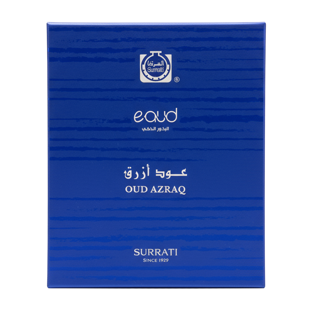 A blue rectangular box for Oud Azraq fragrance by Surrati, featuring white text and a small logo near the top, photographed on a plain white background.