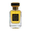 Perfume bottle with gold cap and clear body on a white background