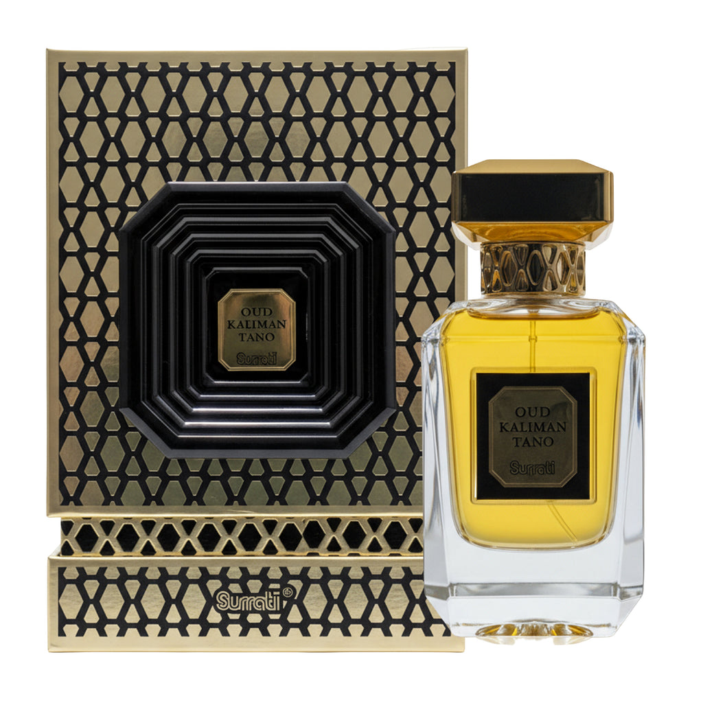 Oud Kalman Tano perfume bottle with golden-yellow liquid next to its patterned black and gold box, featuring a clear glass bottle with a black and gold cap, on a white background.