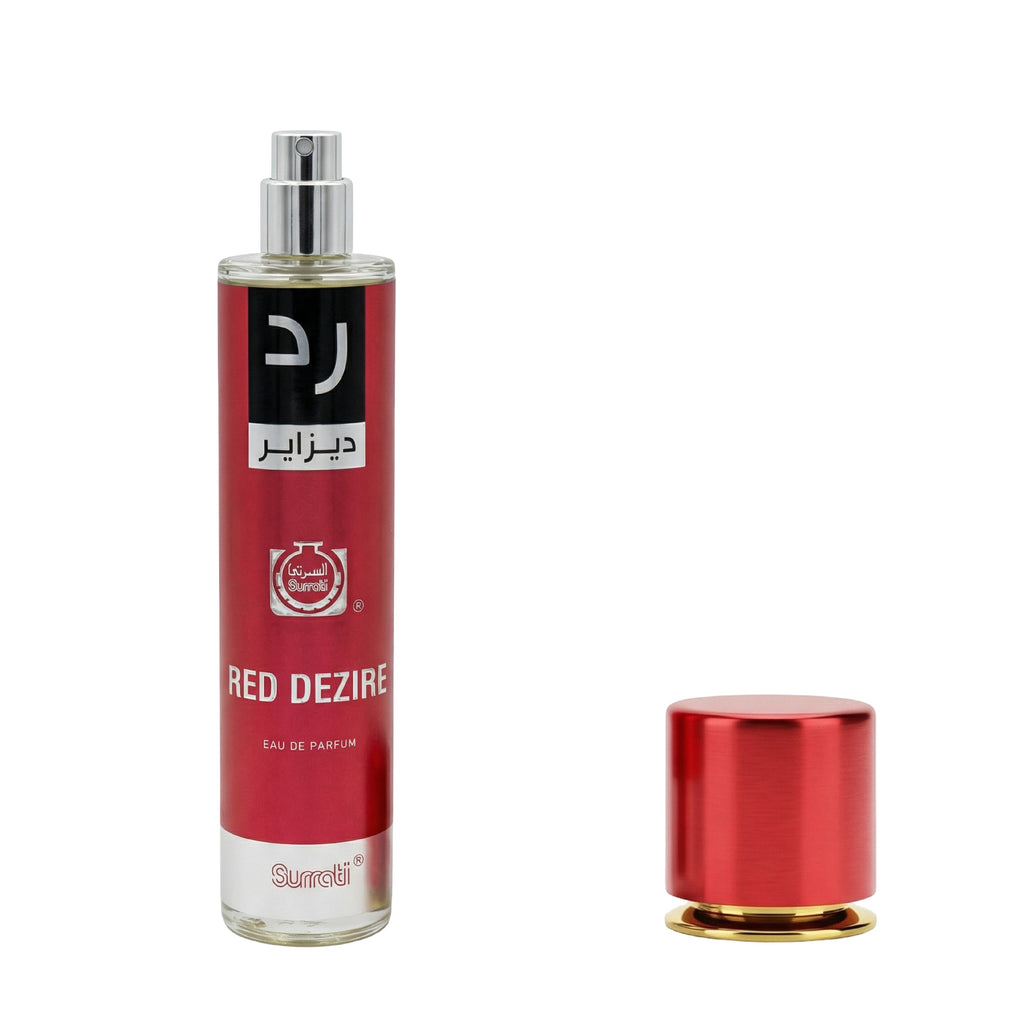 A bottle of Suradi Red Dezire Eau de Parfum with a red label and silver spray nozzle, shown next to its detached metallic red cap on a white background.
