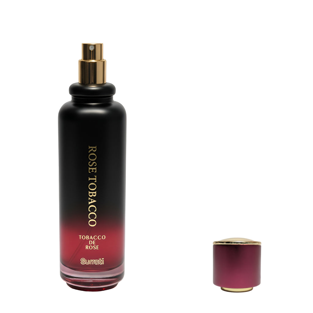 Black and red perfume bottle with gold cap on a white background