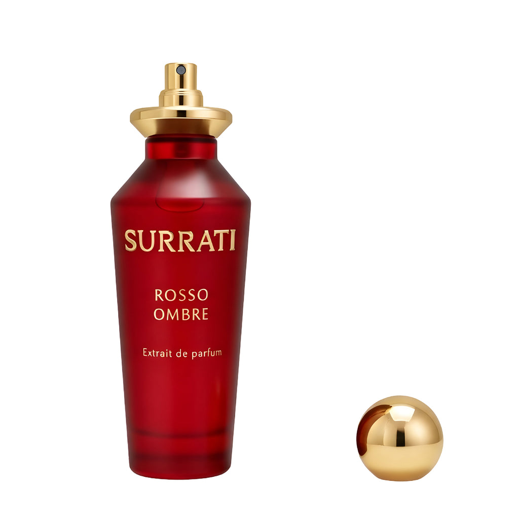 Red Surrati Rosso Ombre perfume bottle with gold cap on a white background