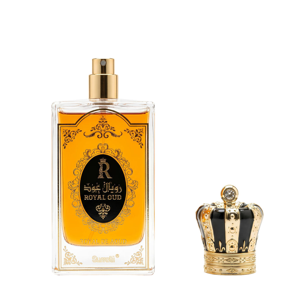 Decorative perfume bottle with gold and black design on a white background