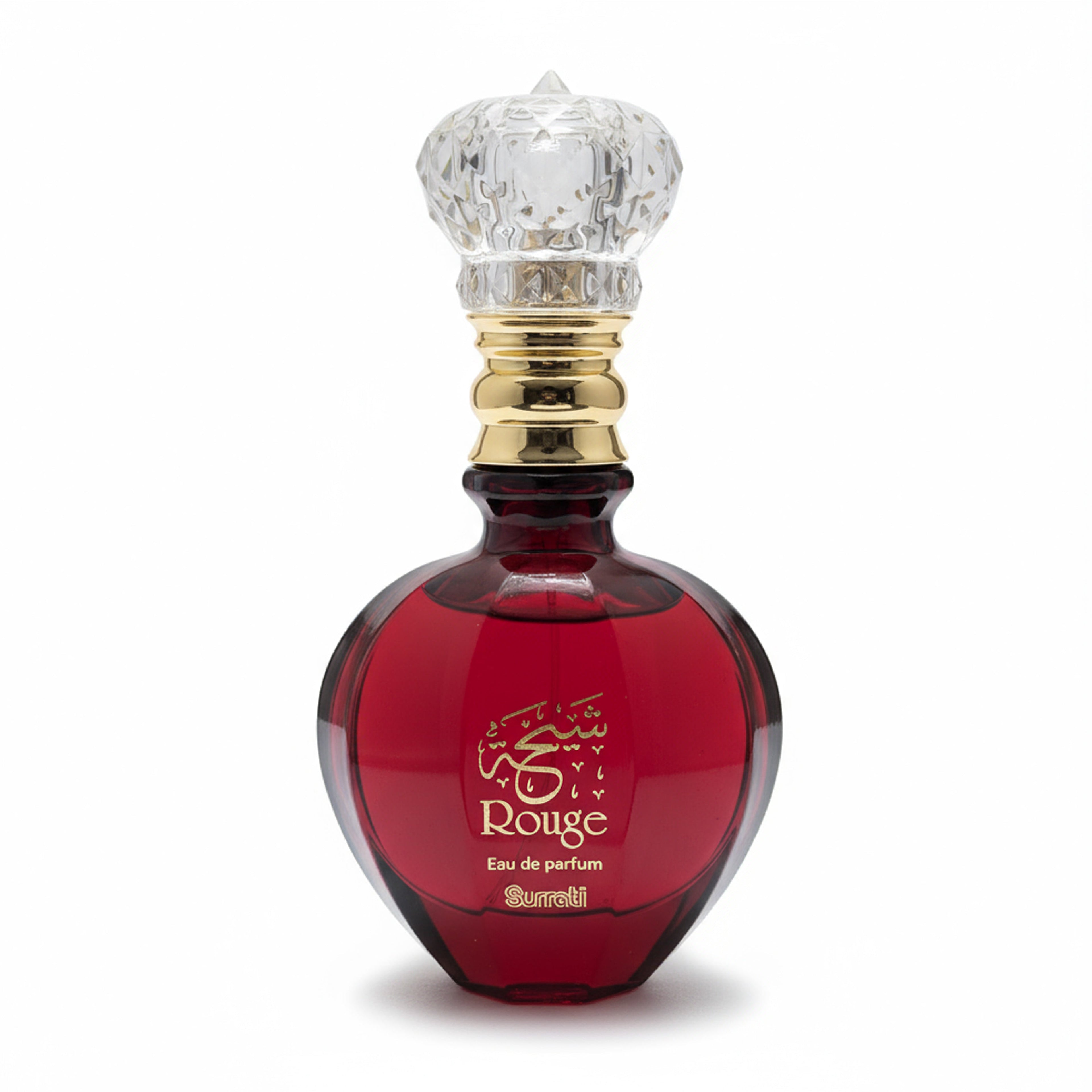 Red perfume bottle with decorative cap on a white background