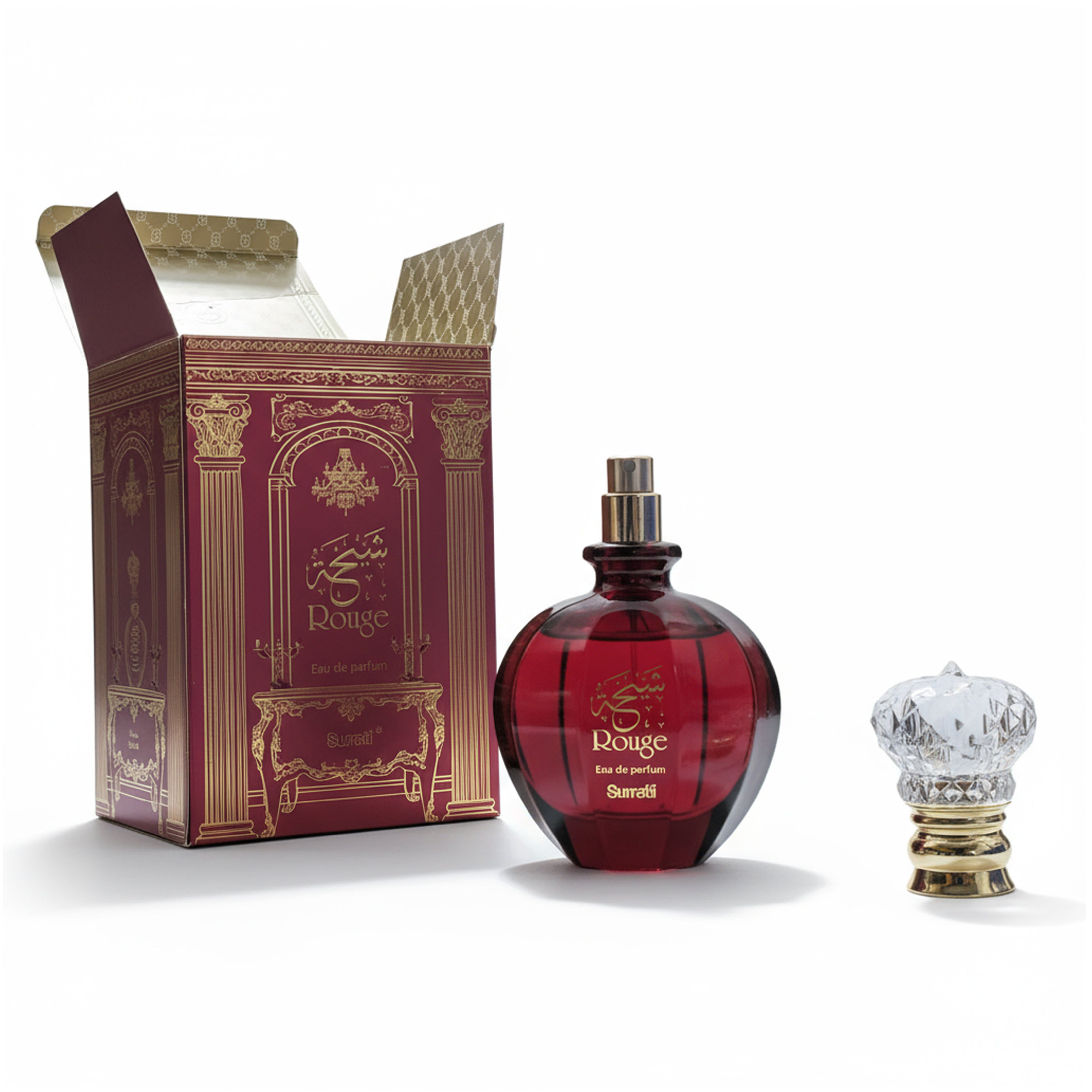 Red perfume bottle with gold cap and decorative box on a white background