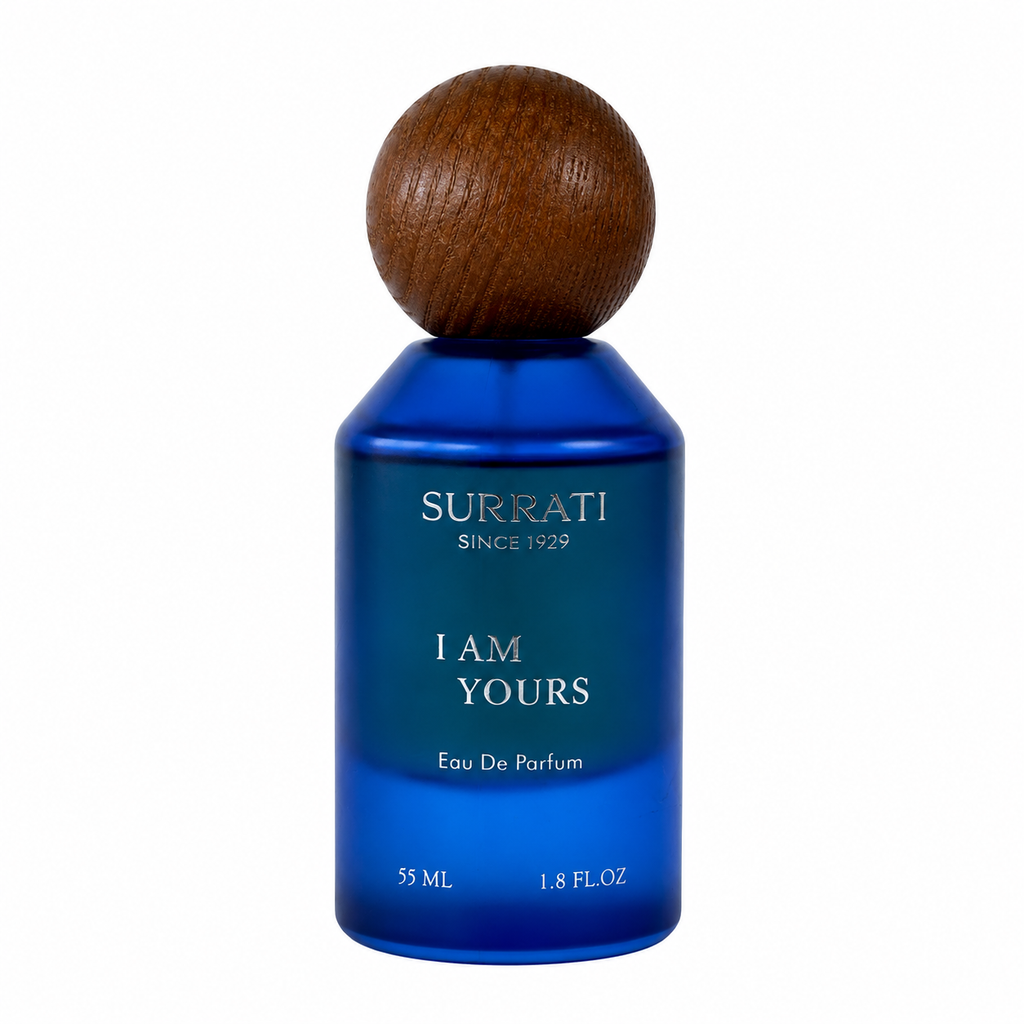 Surrati 'I Am Yours' Eau De Parfum in a cobalt blue bottle with a round wooden cap, shown on a plain white background.