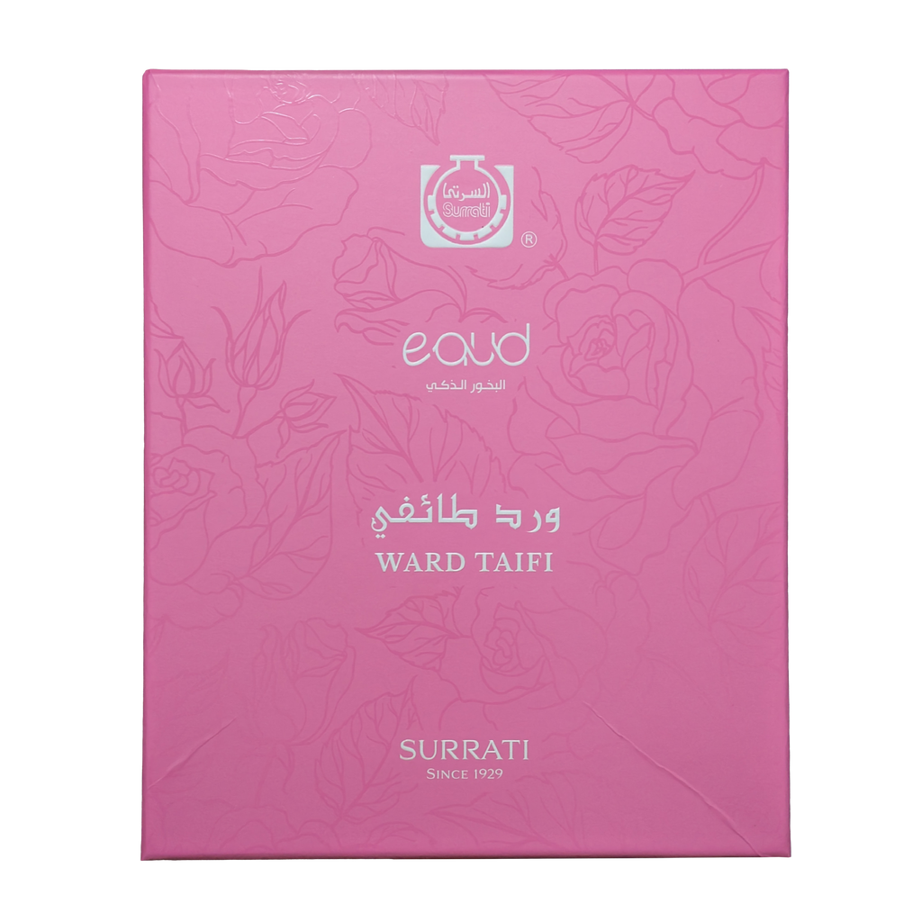 Pink rectangular product packaging box with embossed floral line art, featuring the brand name 'eaud' and 'WARD TAIFI' with Arabic text, on a white background.